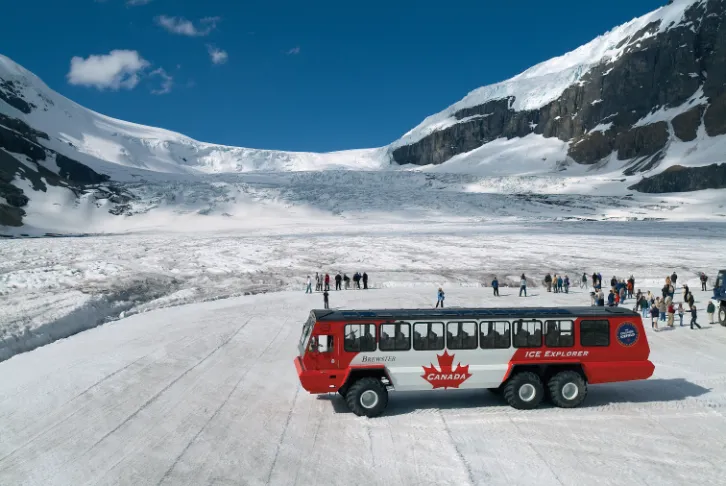 Tour group standing on the Athabasca Glacier in Columbia Icefields.