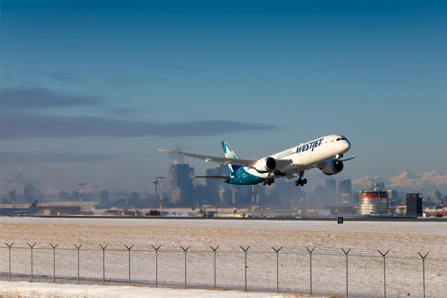 Westjet flight taking off from Calgary international airport.